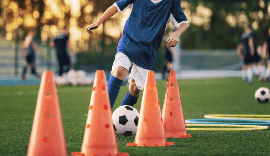 Soccer practice session focused on shooting, passing, and footwork improvement